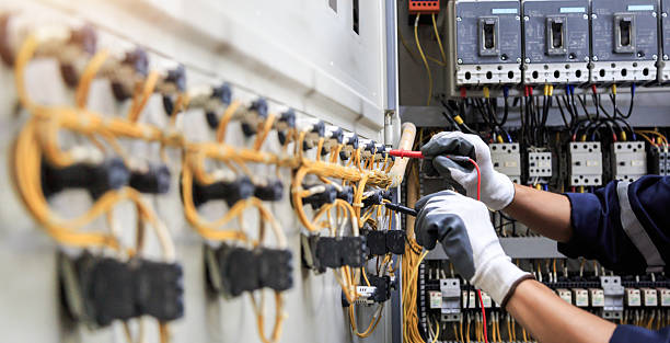 Professional Electrician technician working in North Gates, NY